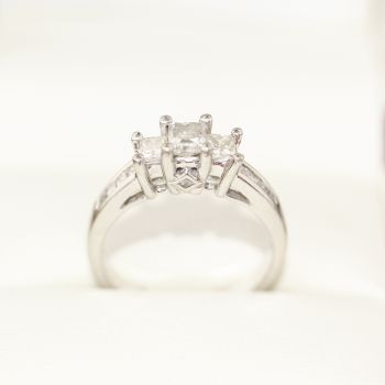 Diamond engagement ring, featuring 8 side princess cut Diamonds, White gold 