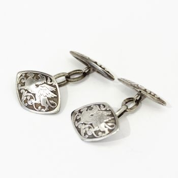 Vintage sterling silver cufflinks with ornate dragon and scroll design