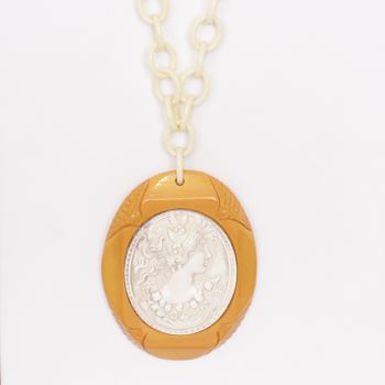 Lovely Butterscotch carved Vintage Bakelite Cameo pendant with celluloid “chain”.  