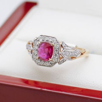 Unique ruby and diamond ring, Exquisite vintage-style engagement ring, Elegant dress ring with ruby and diamonds, Rose gold statement ring, Precious gemstone and diamond ring, Handcrafted ring with halo setting, Luxurious 18ct gold ring, Sparkling ruby an