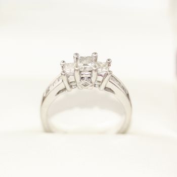 Diamond engagement ring, featuring 8 side princess cut Diamonds, White gold