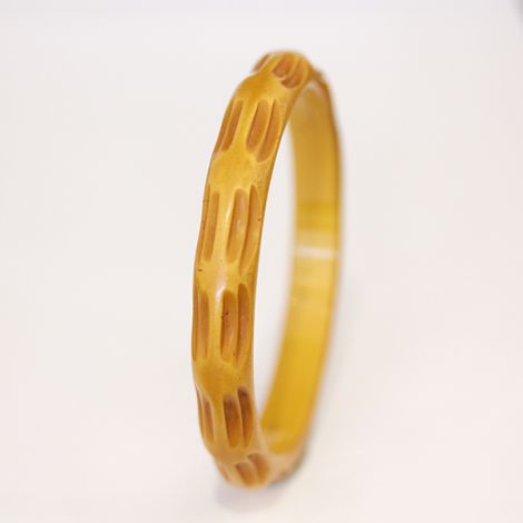 Vintage butterscotch carved Bakelite bangle.  Art Deco Bangle.