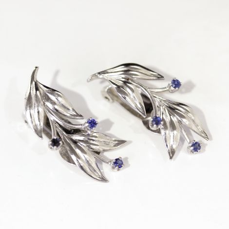 Vintage clip on leaf shaped white gold and sapphire earrings.  Very elegant.
