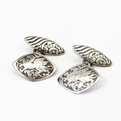 Vintage sterling silver cufflinks with ornate dragon and scroll design