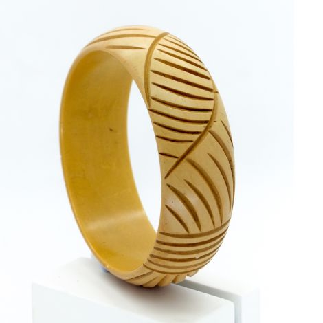 Art Deco light Butterscotch Bakelite Bangle, featuring leaf- like patterns