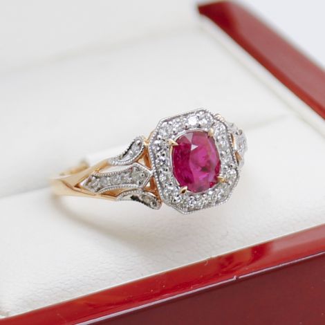 Unique ruby and diamond ring, Exquisite vintage-style engagement ring, Elegant dress ring with ruby and diamonds, Rose gold statement ring, Precious gemstone and diamond ring, Handcrafted ring with halo setting, Luxurious 18ct gold ring, Sparkling ruby an