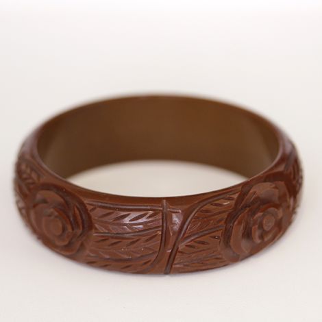 Art Deco era Mahogany Bakelite bangle, with carved flower and leaf design.