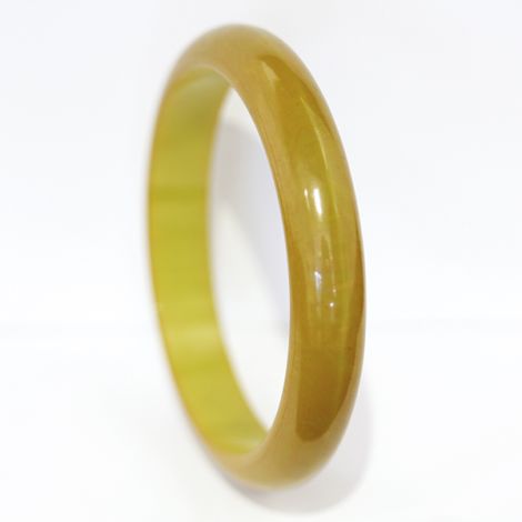 Art Deco mustard coloured bakelite bangle with marbling.