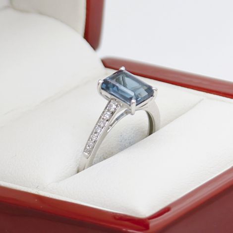 Emerald cut sapphire engagement ring
