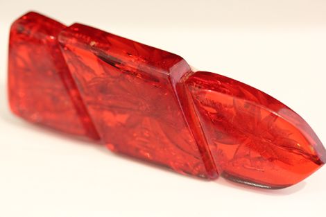 Cherry Red, reverse carved Bakelite brooch with Fern Like inclusions as in Amber, Art Deco, C1930's
